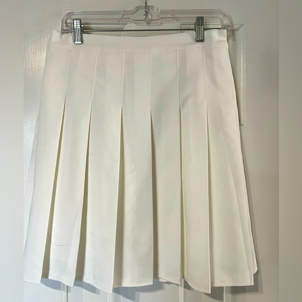 White pleated skirt